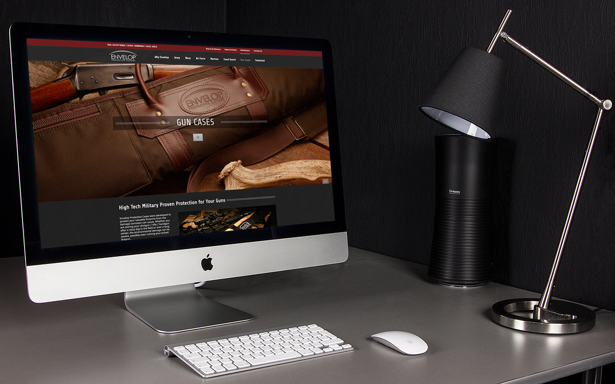 An iMac computer displaying a designed website selling gun cases